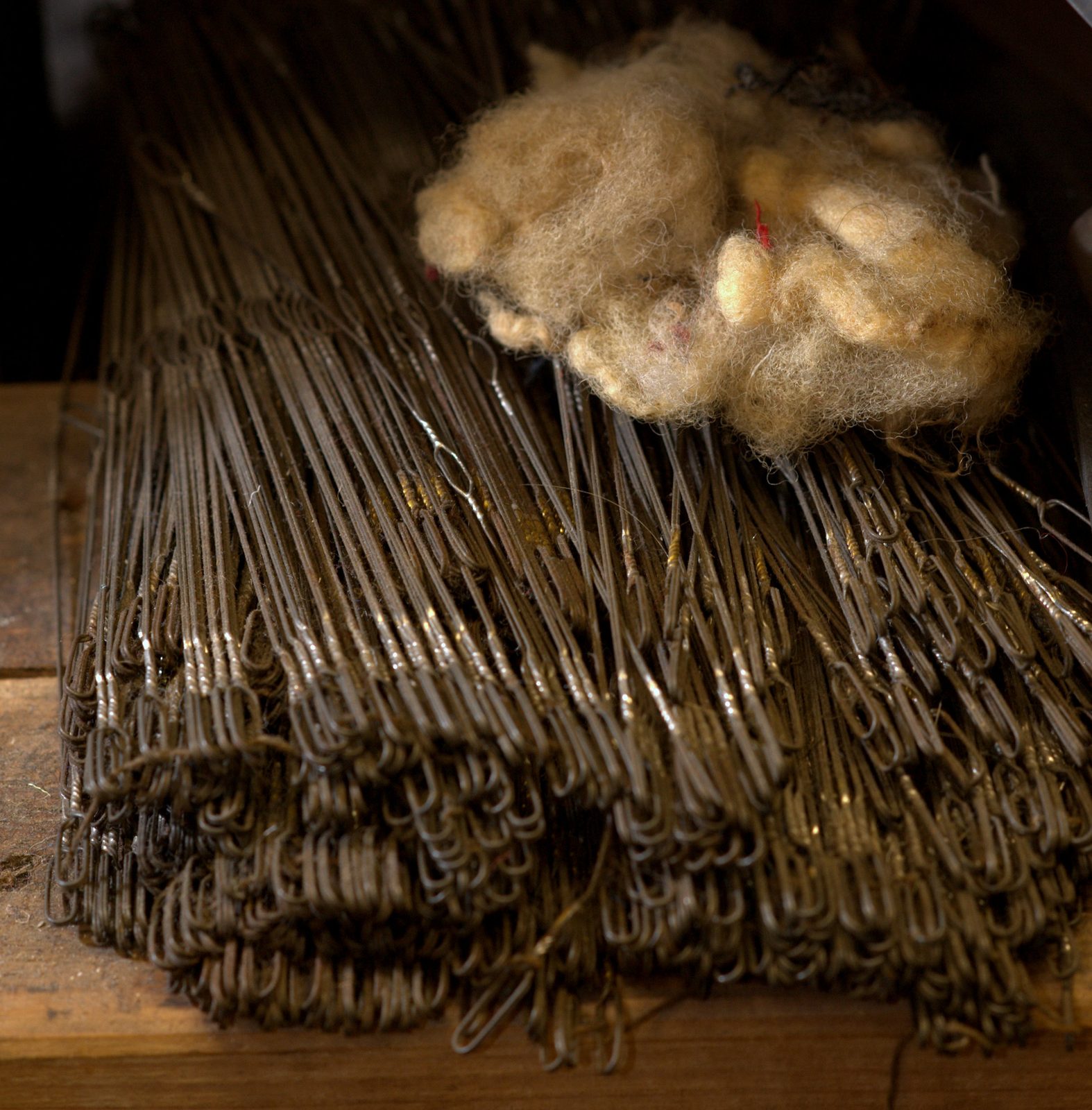 Fleece on the heddle wires