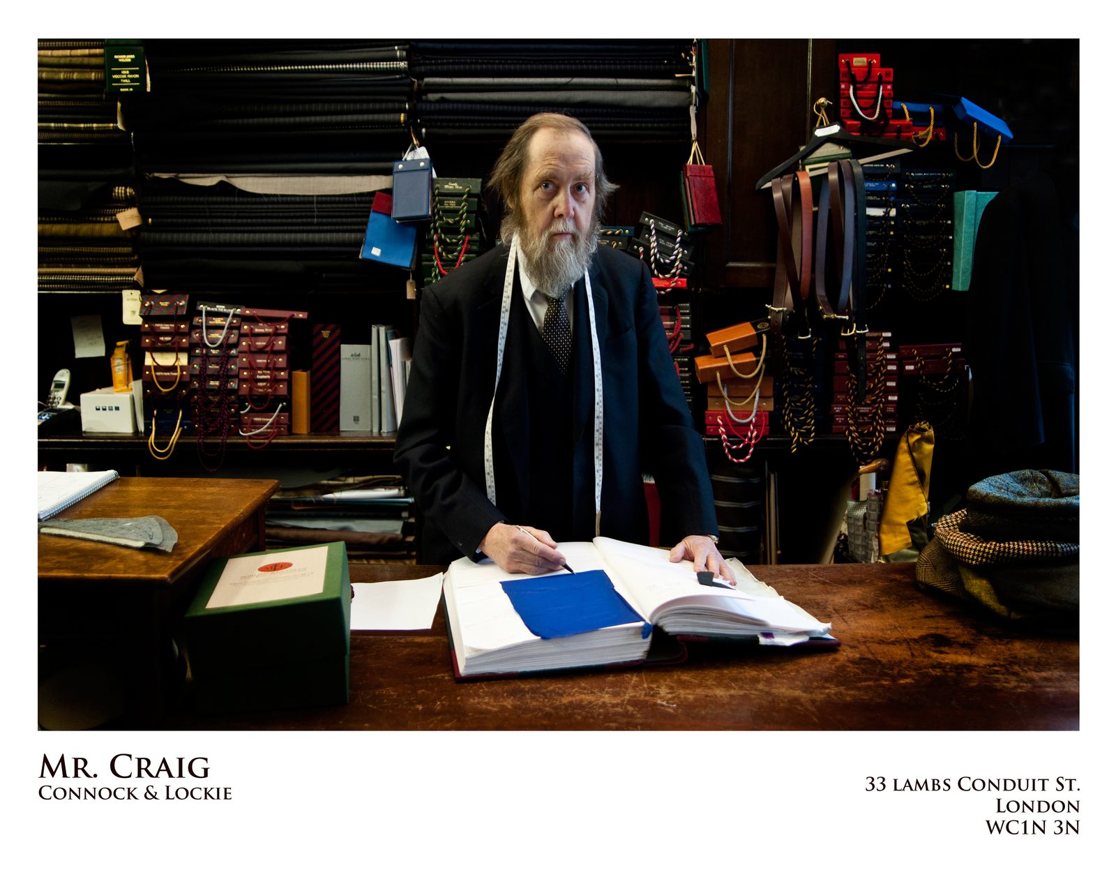 Mr Craig at his ledger -  Harris Tweed tailor