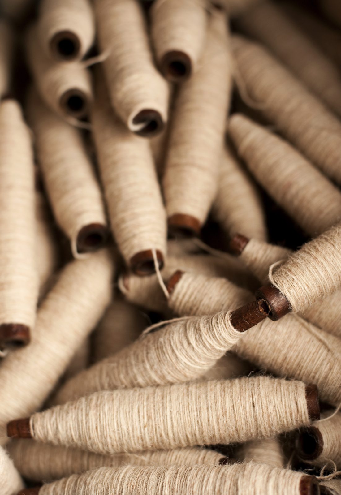 Bobbins of natural wool