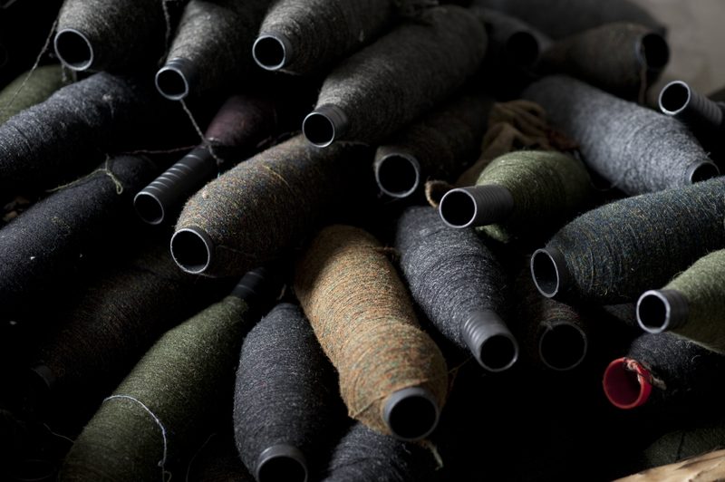 Bobbins of tweed yarn