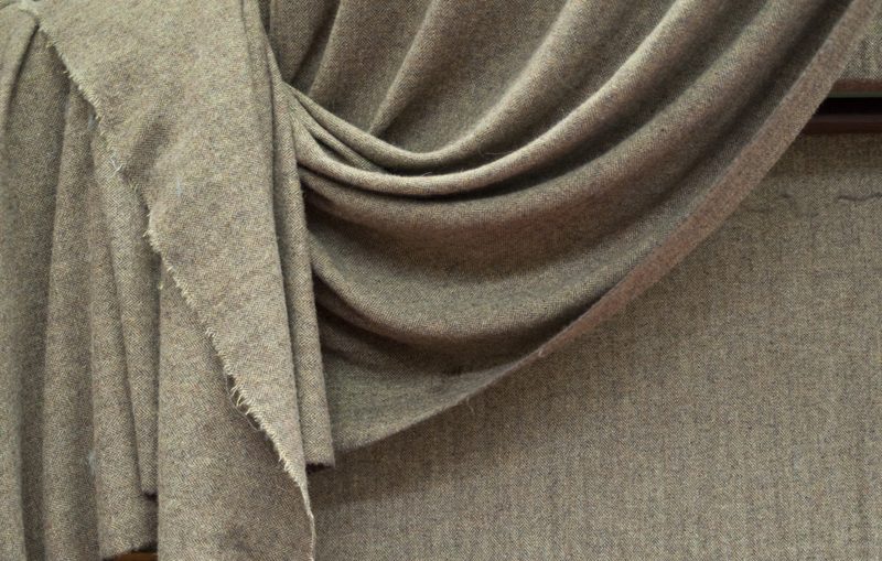 Fawn tweed, draped