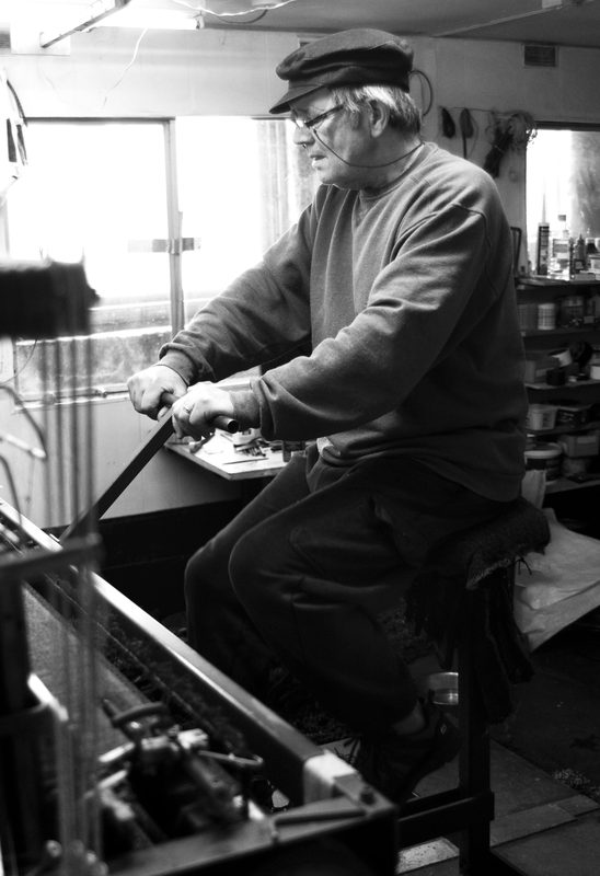 A weaver at his loom