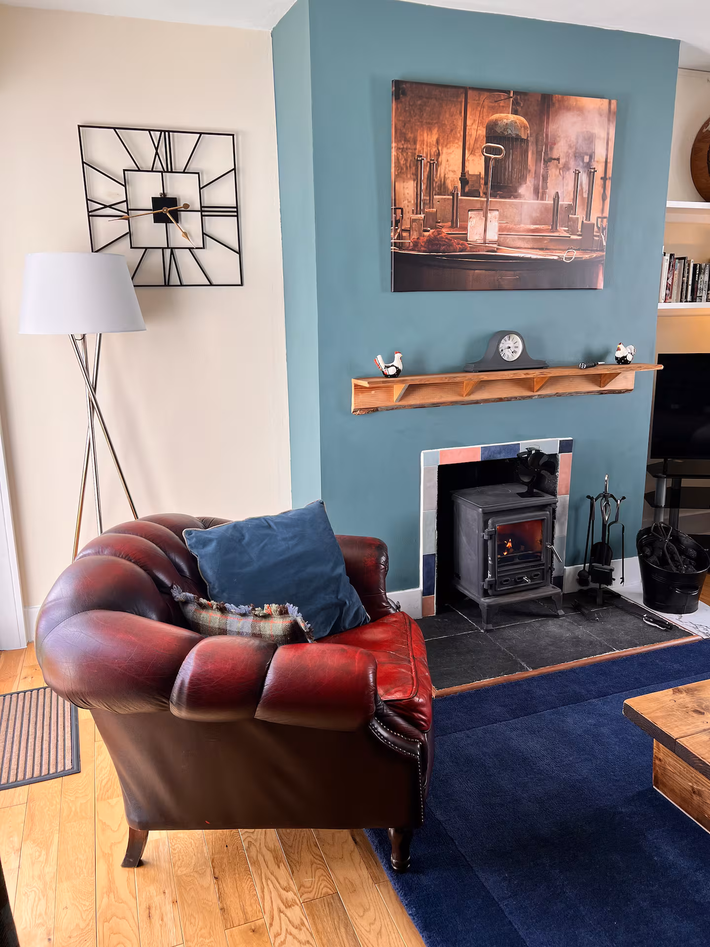 Armchair beside the wood-burning stove