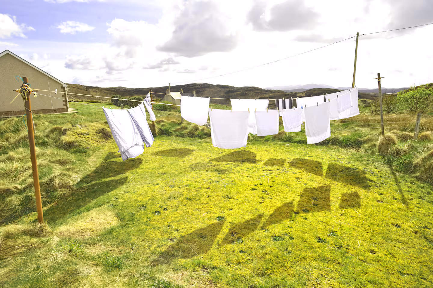 Washing line on the drying green outside the cottage